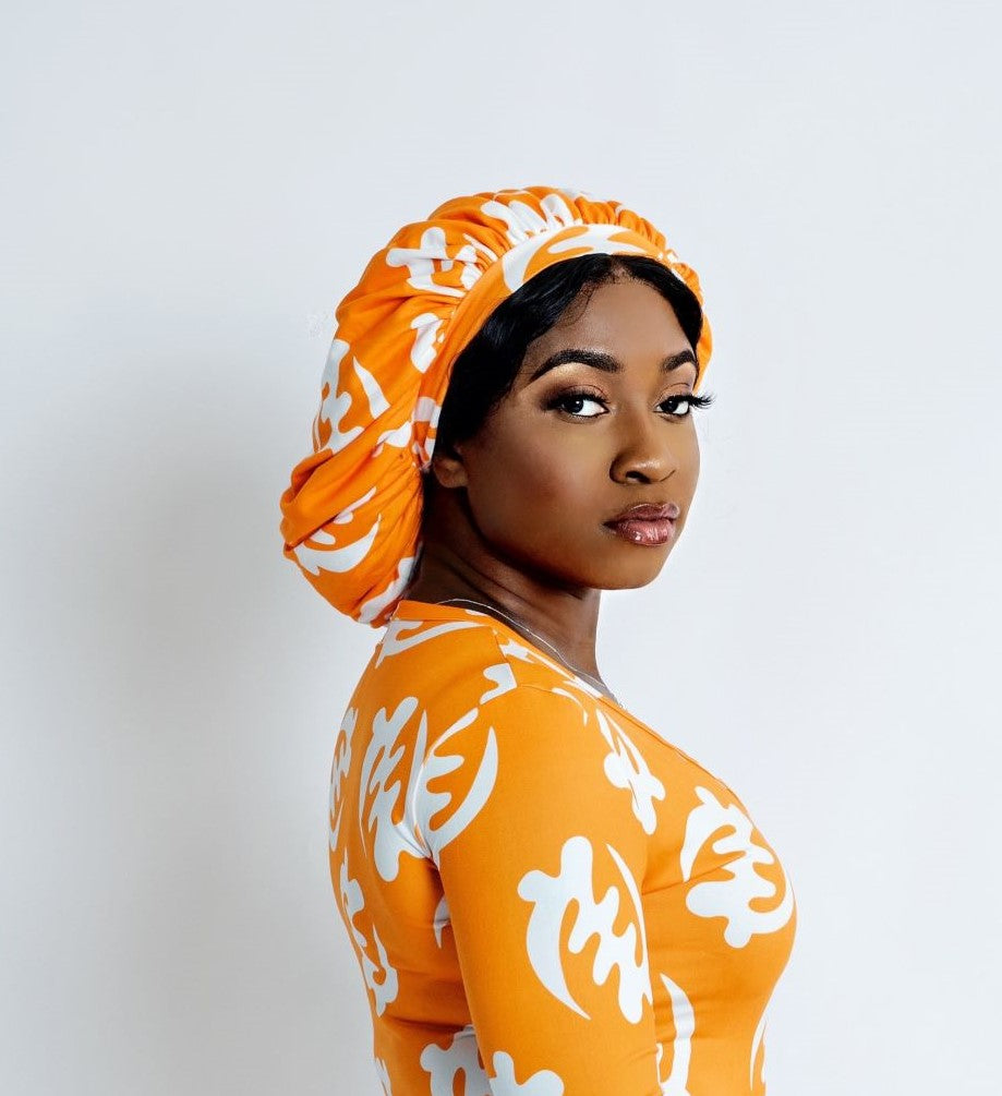Orange 'Gye Nyame' hair bonnet